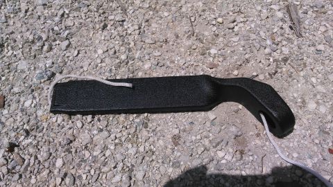 1990 Ford F-250 - feed a durable rope through the sleeve so we can pull the belt through. even after grindingt he corners of the metal tab, it still takes a…