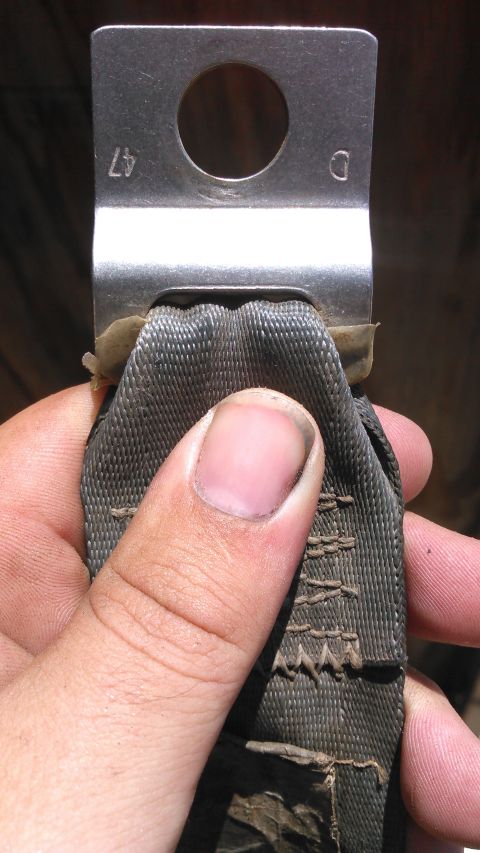1990 Ford F-250 - metal tab before grinding