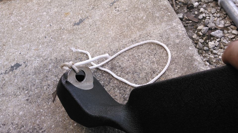 got it through. untie the knot and put tab back inside