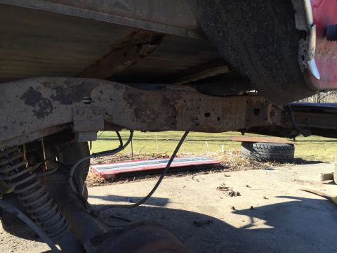 1996 Ford F-150 - rear rusty spring hangers removed.