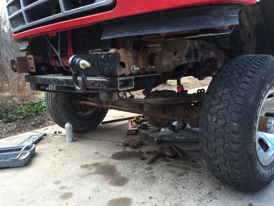 Painted crossmember, springs installed, under the truck
