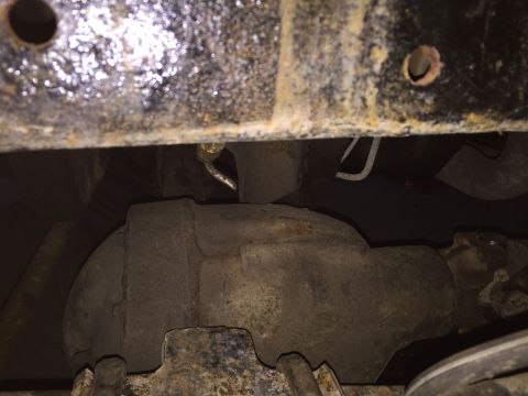 1996 Ford F-150 - gear housing to engine crossmember interference.