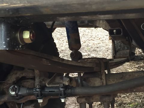 1996 Ford F-150 - Rusty truck suspension parts are visible in this close-up view.