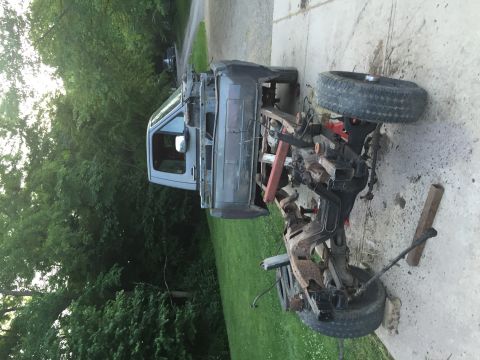 1967 Ford Custom Wagon - Truck chassis with cab, front clip removed, undergoing work.