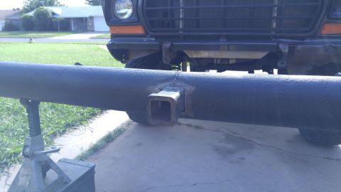 1978 Ford Bronco - A custom tubular bumper with a hitch receiver is attached to the front of a vintage Ford Bronco.
