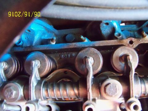 1968 Mercury Cougar - Engine valve train components, including rocker arms and springs, with part number 8012 visible.