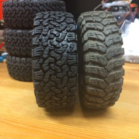 1989 Ford Bronco - A new tire is compared to a used tire, showing tread wear differences.