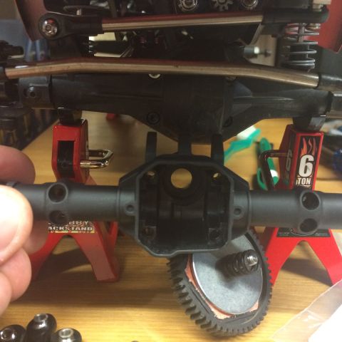 1989 Ford Bronco - Close-up view of an RC car's axle assembly, showing the differential housing and associated gears.
