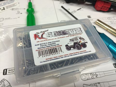 1989 Ford Bronco - A clear plastic box contains a screw kit for an RC car, with product details visible on the label.