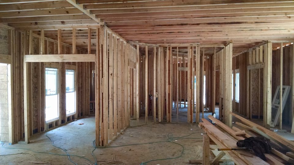 Living room looking southeast through the office & kitchen
