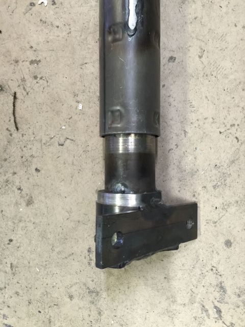 1965 Ford Mustang - This is a close-up view of a welded metal part with an attached bracket.