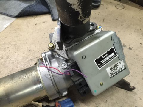1965 Ford Mustang - This is a close-up view of a power steering motor and control unit, likely a replacement part.