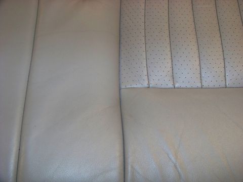 2001 Mercury Grand Marquis - Perforated leather seat upholstery detail, likely from a car interior.