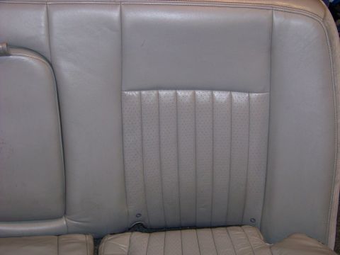 2001 Mercury Grand Marquis - The perforated leather pattern on this rear car seat is visible.
