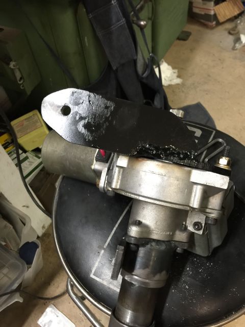 1965 Ford Mustang - Custom steering column part with a welded bracket, likely for a vehicle modification project.