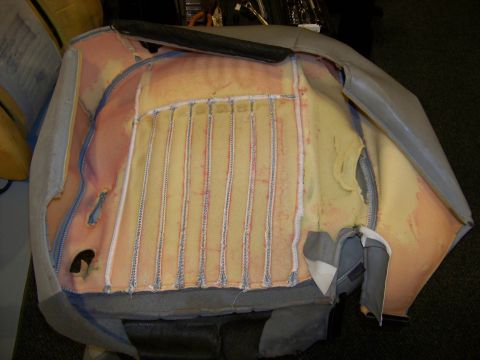 2001 Mercury Grand Marquis - Disassembled car seat showing foam padding and internal metal spring support system.
