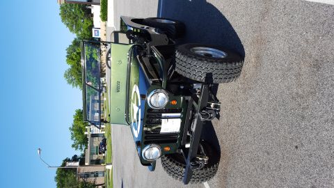 1948 Jeep Wrangler - 1948 Willys CJ-3A Jeep with distinctive grille and round headlights.