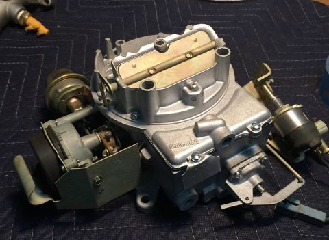 1978 Ford Bronco - Close-up of a Motorcraft carburetor, likely for a classic Ford vehicle.
