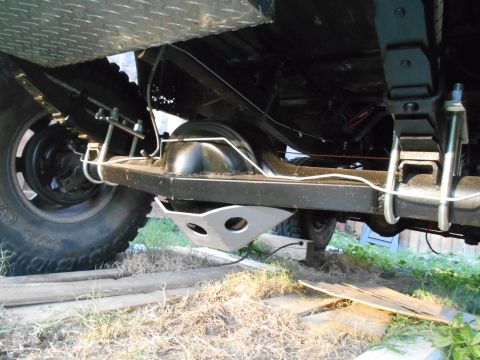 1972 Ford Bronco - Underside view of a 1972 Ford Bronco, showing the rear axle and suspension components.