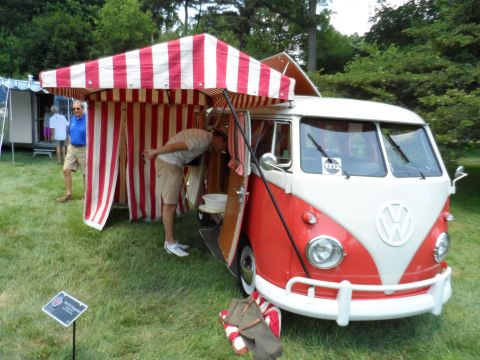 1971 Ford Ranchero - A vintage VW bus has been converted into a charming food stand with a striped awning.