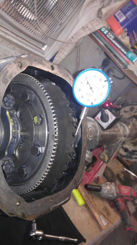 1991 Ford Bronco - A dial indicator is used to measure backlash on a differential gear assembly.