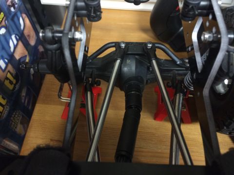 1989 Ford Bronco - Close-up view of the undercarriage and suspension system of a remote control car.