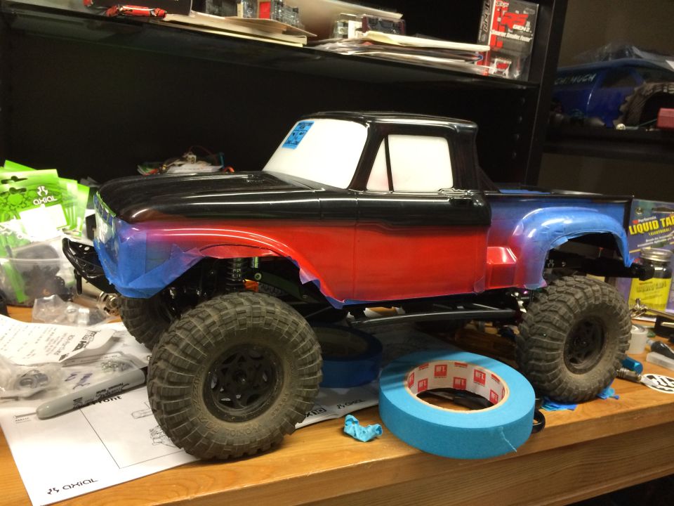 RC truck body, side view, red and blue gradient paint, black roof, large tires