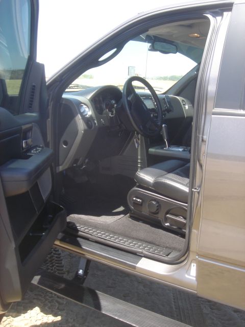 2005 Ford F-150 - Interior view of a truck's cabin, showing the driver's seat and dashboard.