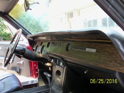 1968 Mercury Cougar - Interior view of a 1968 Mercury Cougar XR7, highlighting the dashboard and driver's side.