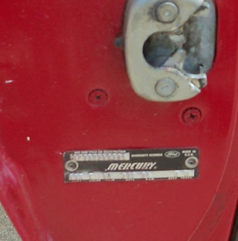 1968 Mercury Cougar - A vehicle's identification plate is shown attached to the door frame.