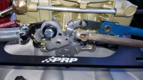 1978 Ford Bronco - This photo shows a close-up view of a carburetor linkage system, PRP branding and a Supermotors watermark.
