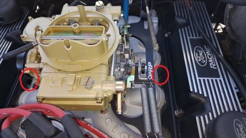 1978 Ford Bronco - Close-up view of engine components, including a carburetor and Ford Racing valve covers.