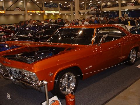 1999 Ford Crown Victoria - '67 Chevy Impala SS. Nice color.