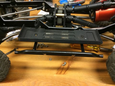 1989 Ford Bronco - Close-up view of an RC car's chassis, showing the drivetrain and suspension parts.
