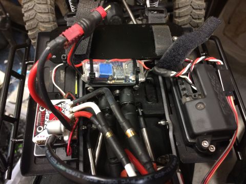 1989 Ford Bronco - Close-up view of the complex electronic components and wiring inside a remote control car.