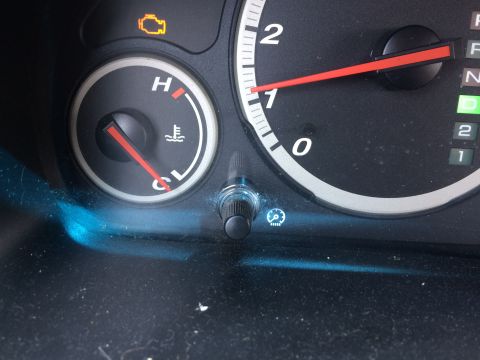 2003 Honda CR-V - Dashboard gauges show a cold engine temperature and an illuminated check engine light.