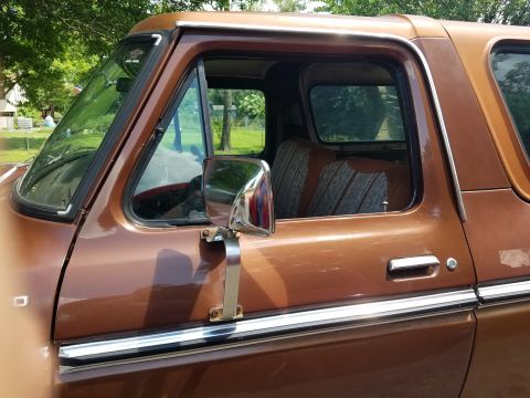 1979 Ford Bronco - This 1979 Ford Bronco features a classic side profile with its distinctive body style and comfortable interior.