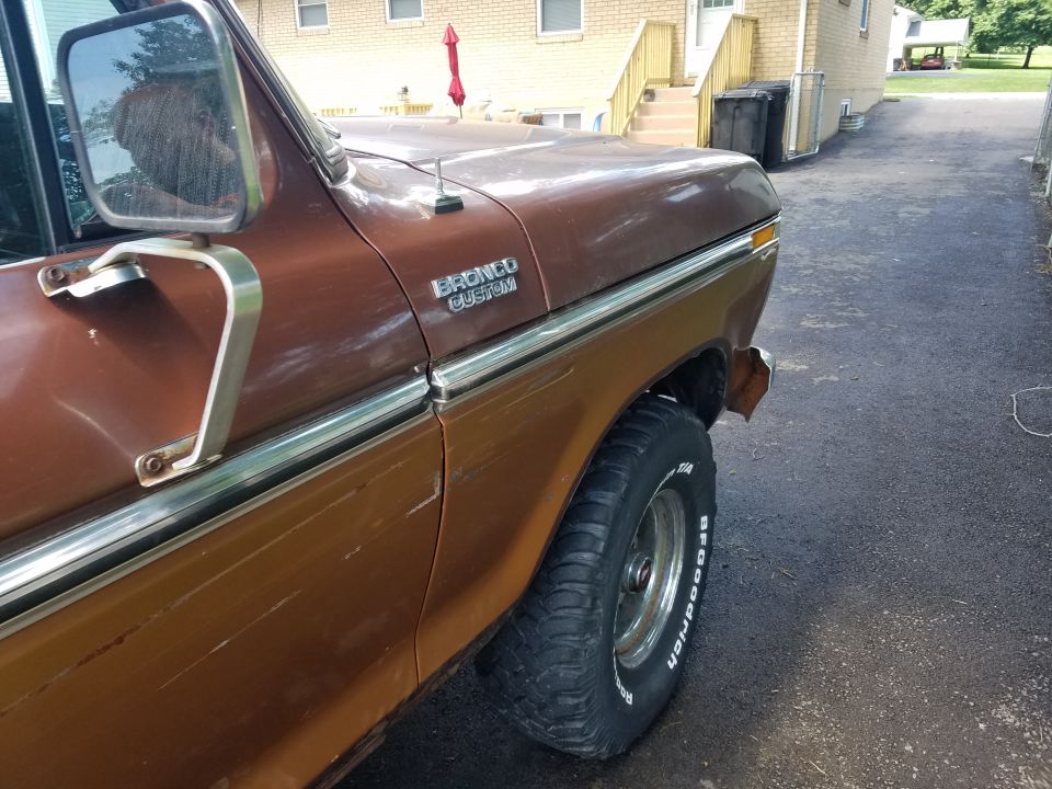 1979 Ford Bronco Custom fender and door, brown paint, chrome trim, BFGoodrich tire