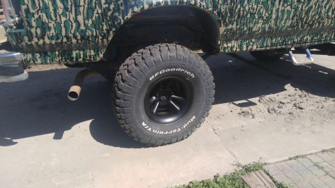 1991 Ford Bronco - A 1991 Ford Bronco is shown from the side, camouflage paint and BFGoodrich Mud-Terrain T/A tires.