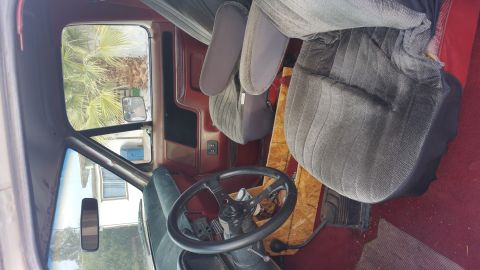 1988 Ford Bronco - Interior view of a 1988 Ford Bronco, the driver's seat and dashboard area.