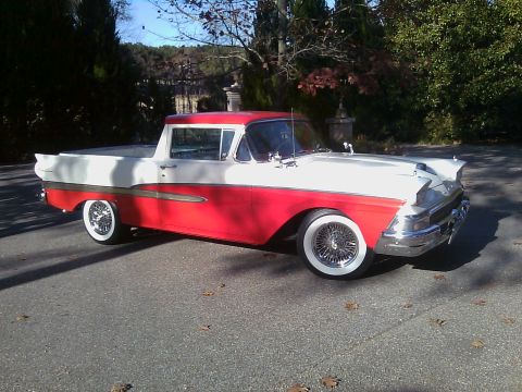 1958 Ford Ranchero - This classic 1958 Ford Ranchero features a distinctive two-tone red and white paint scheme.