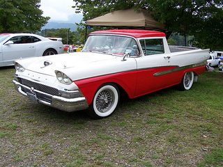 1958 Ford Ranchero - This two-tone red and white 1958 Ford Ranchero features classic styling and wire wheels.