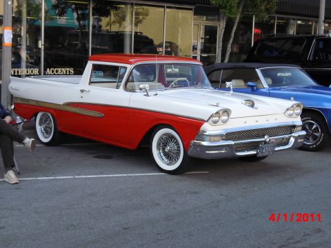 1958 Ford Ranchero - Two-tone 1958 Ford Ranchero with wire wheels and whitewall tires is parked on asphalt.