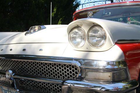 1958 Ford Ranchero - Close-up of the front of a 1958 Ford Ranchero, showing its distinctive grille and headlights.
