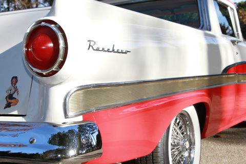 1958 Ford Ranchero - Close-up of the rear of a classic Ford Ranchero, highlighting its distinctive tail light and two-tone paint scheme.