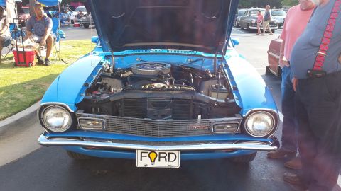 1976 Ford Ranchero - Front view of a blue 1972 Ford Ranchero with its hood open, revealing the engine compartment.