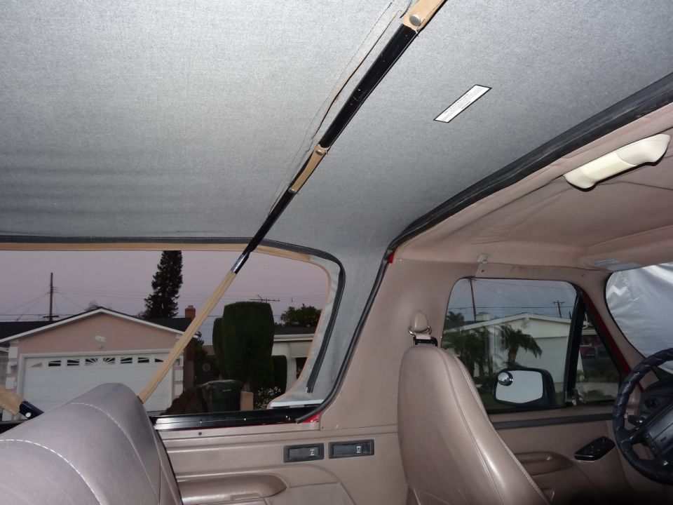 Interior view of a 1994 Ford Bronco soft top showing headliner and rear window frame