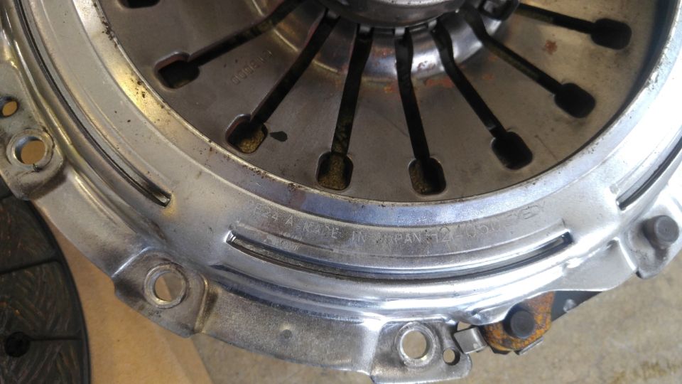 Clutch pressure plate with "MADE IN JAPAN" stamp.
