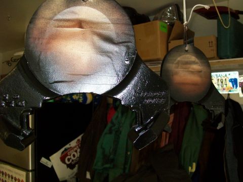 1991 Ford Bronco - A close-up shot of two black metal targets hanging in front of shelves stocked with boxes and clothing. A Montana license plate is visible…