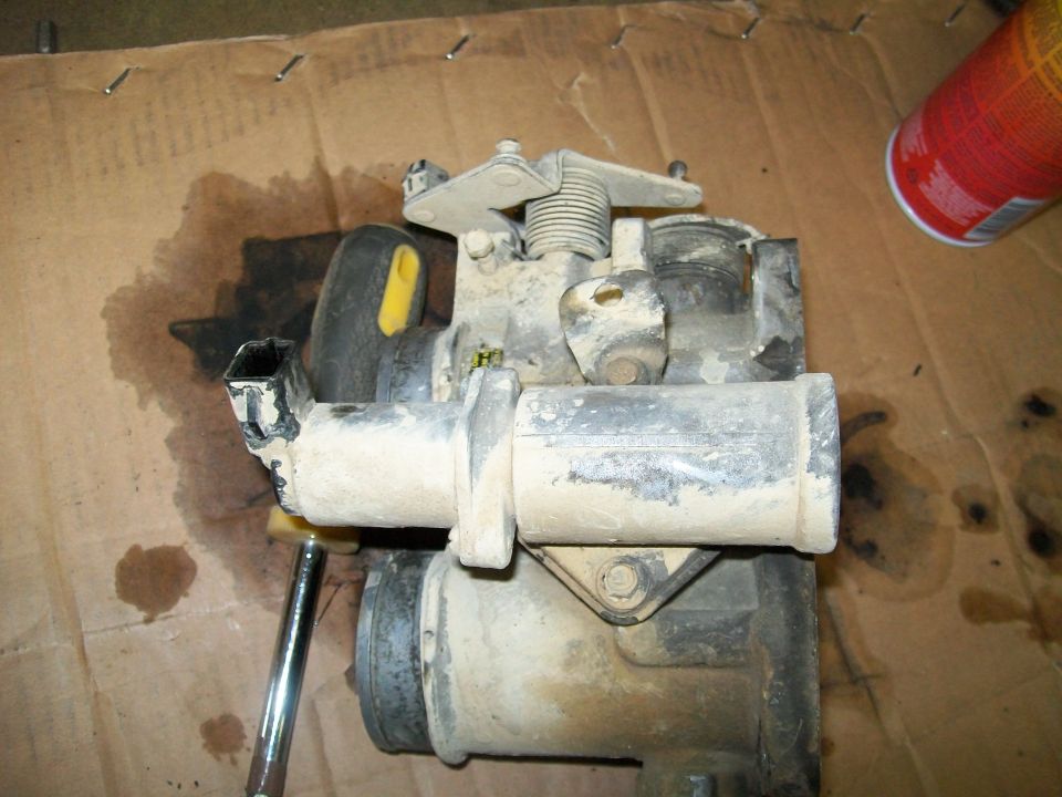 carburetor sitting on a surface